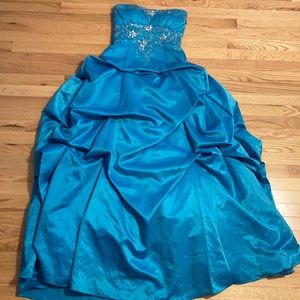 City Triangles Blue Strapless Ruffled Ballgown with a Rouched Bust and Crystals